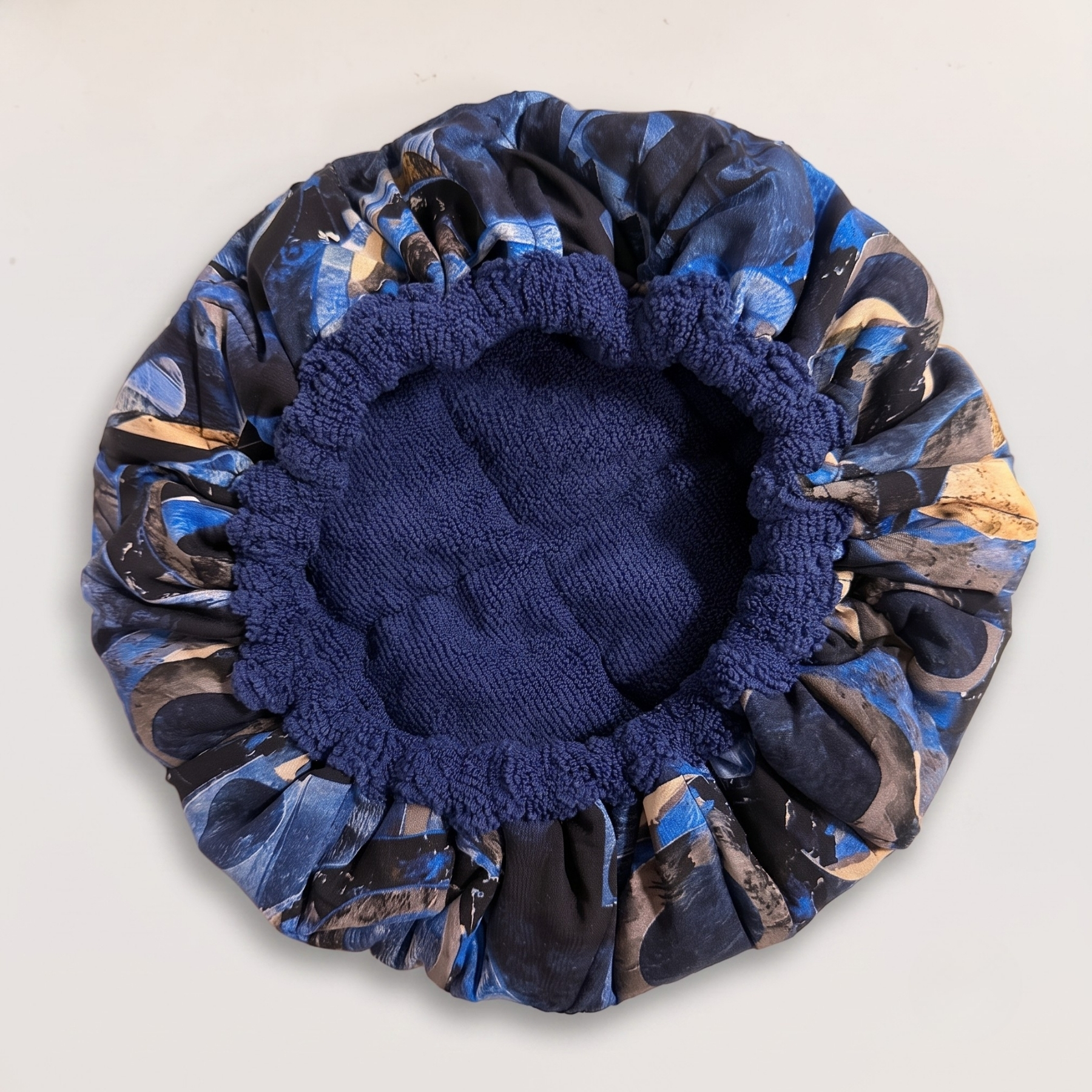 Gorro térmico Magnetic blue anverso santos rizos
